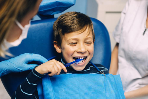 boy, smile, brushing teeth, dentist, dental care for kids, dentist in vaughan